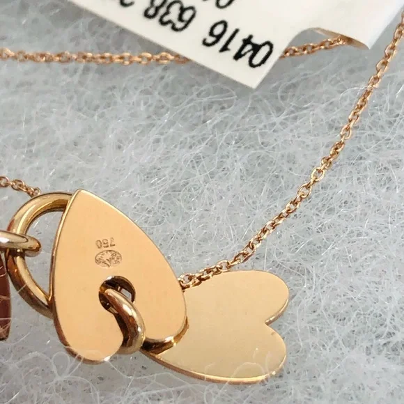 GINETTE NY
Angele 18K Rose Gold 3 Mini Heart Charms 17” Necklace - Picture 9 of 15